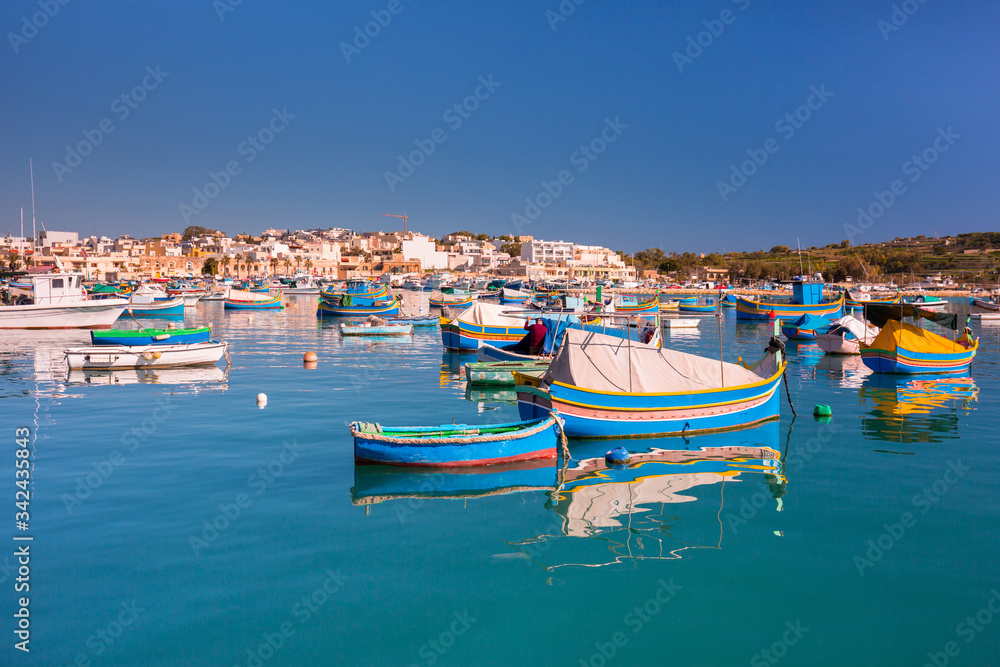 Traditional fishing boats in the Mediterranean Village of Marsaxlokk, Malta