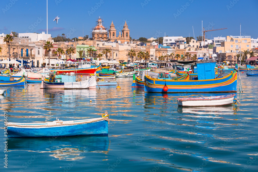 Traditional fishing boats in the Mediterranean Village of Marsaxlokk, Malta