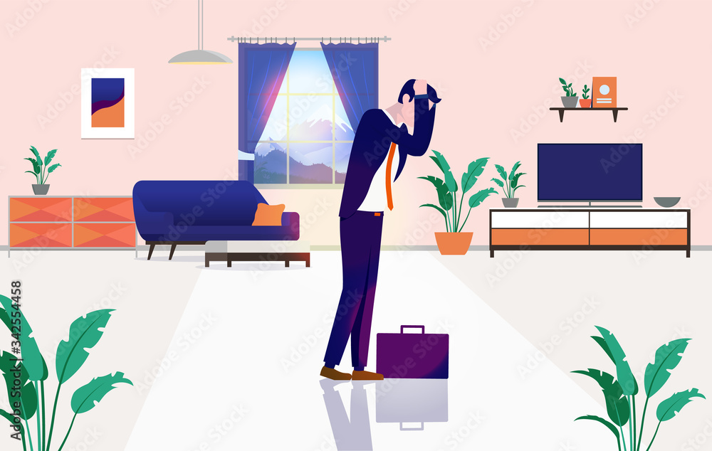 Depressed man at home in living room - Businessman alone feeling exhausted, stressed and frustrated 