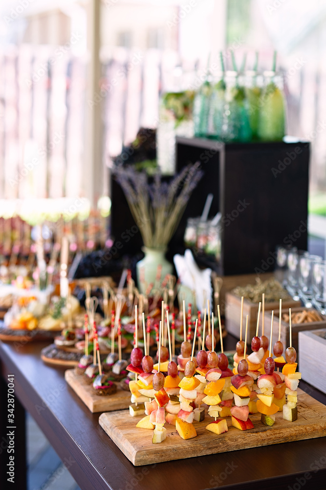 The food lies beautifully on the table, laid out in order, beautifully decorated