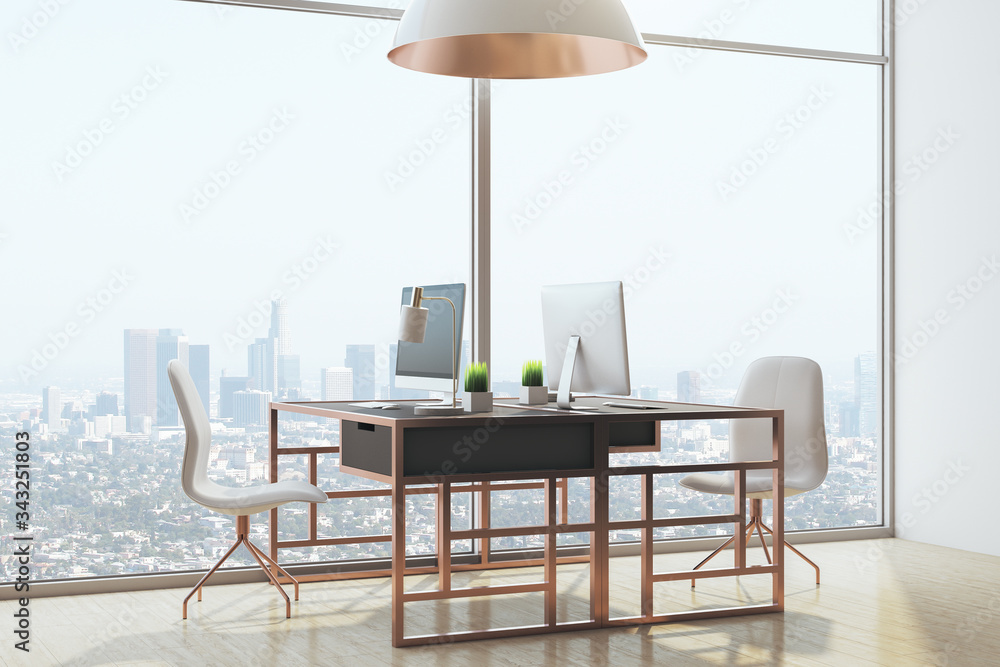 Luxury office room with computers and panoramic city view.