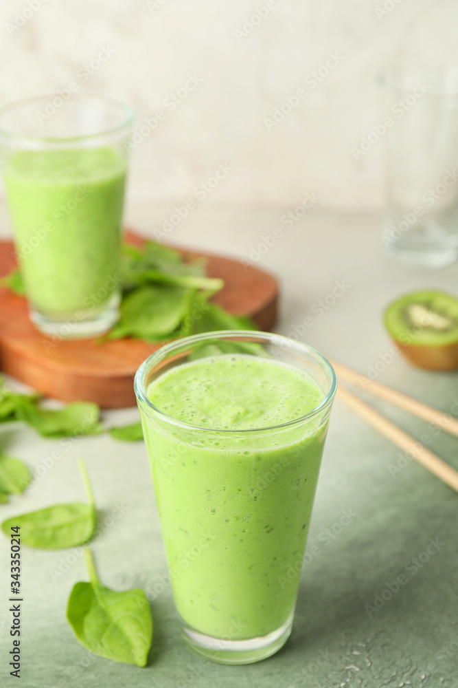 Glasses of healthy smoothie on table