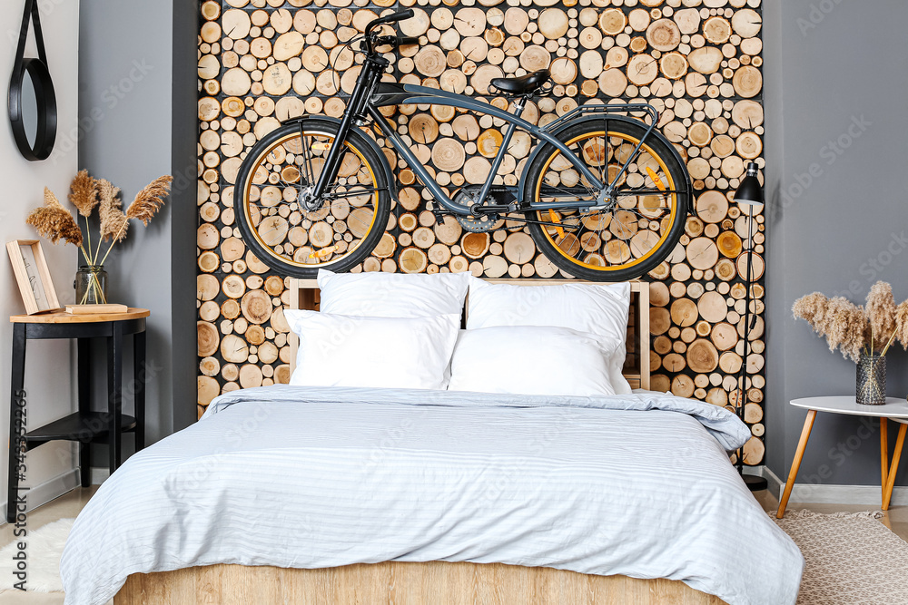 Interior of modern bedroom with bicycle