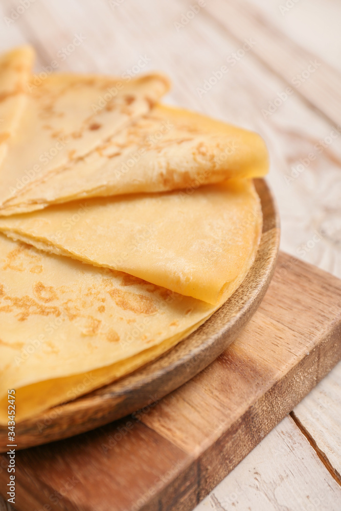 Tasty blini on table, closeup