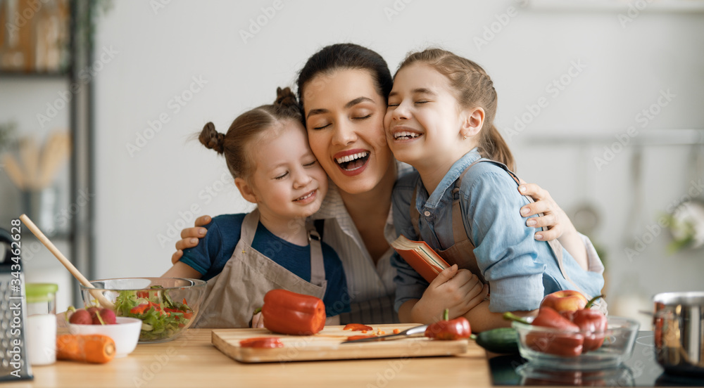 Happy family in the kitchen.