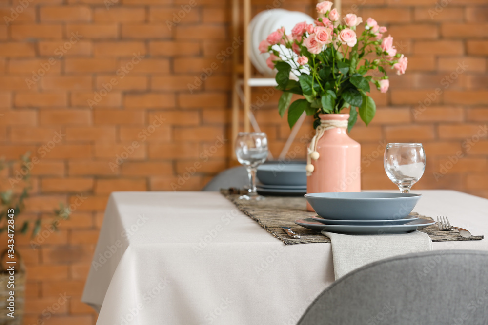 Bouquet of flowers on table in dining room