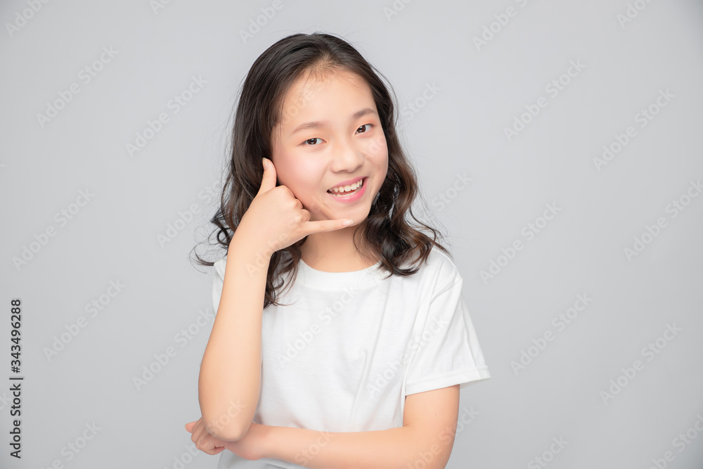 Asian primary school girls in gray background