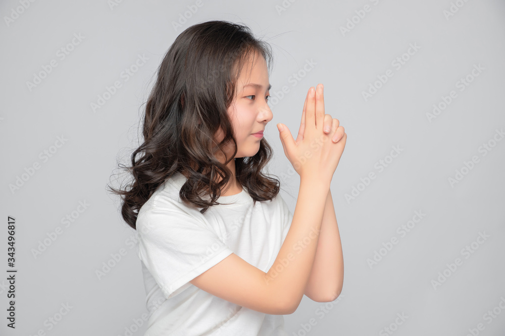 Asian primary school girls in gray background