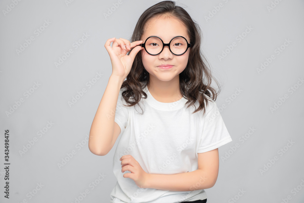 Asian primary school girls in gray background