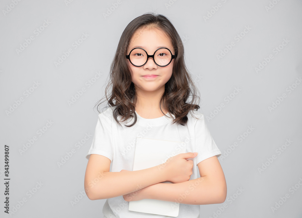 Asian primary school girls in gray background