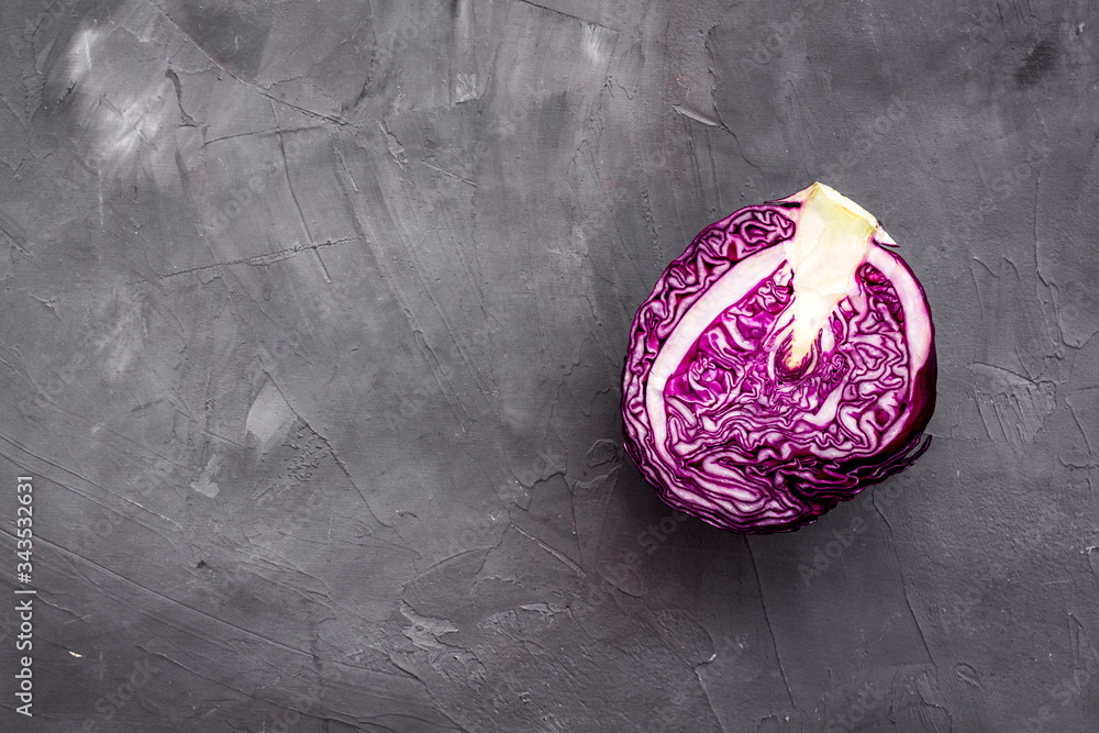 Red cabbage - head, cross section - on grey background top view copy space