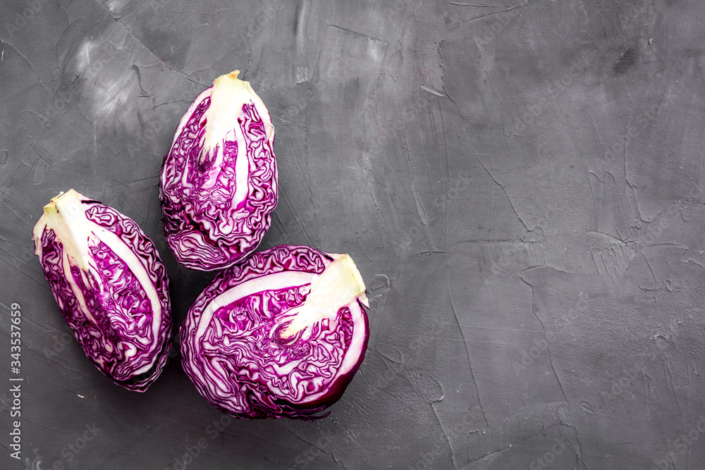 Red cabbage on grey table top down copy space