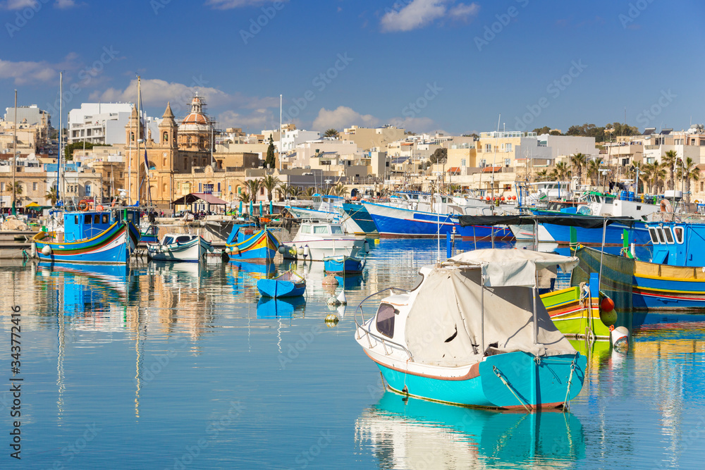 Traditional fishing boats in the Mediterranean Village of Marsaxlokk, Malta