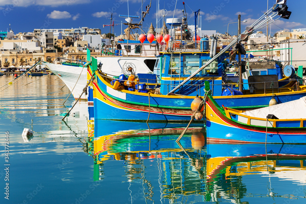 Traditional fishing boats in the Mediterranean Village of Marsaxlokk, Malta