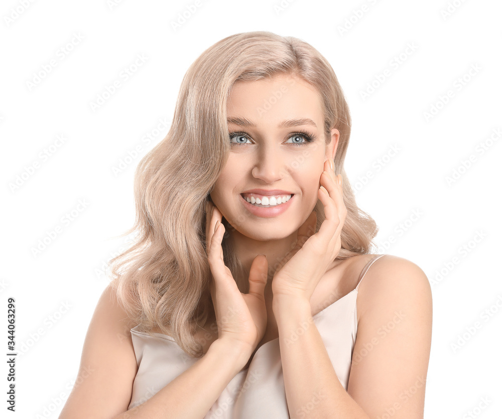 Young blonde with beautiful hair on white background