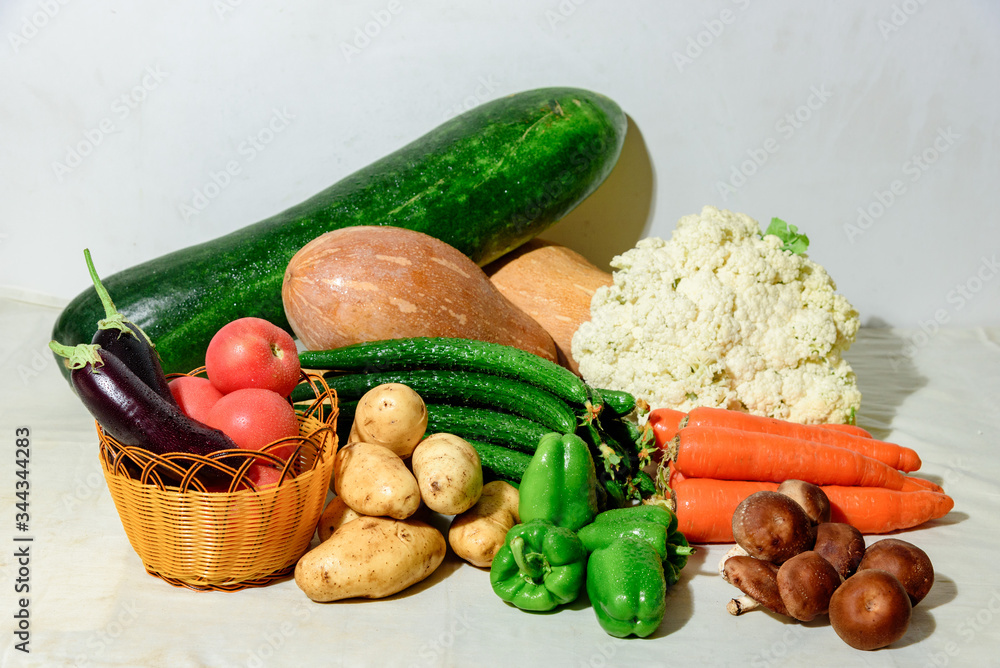 Healthy food, fresh organic vegetables on white background