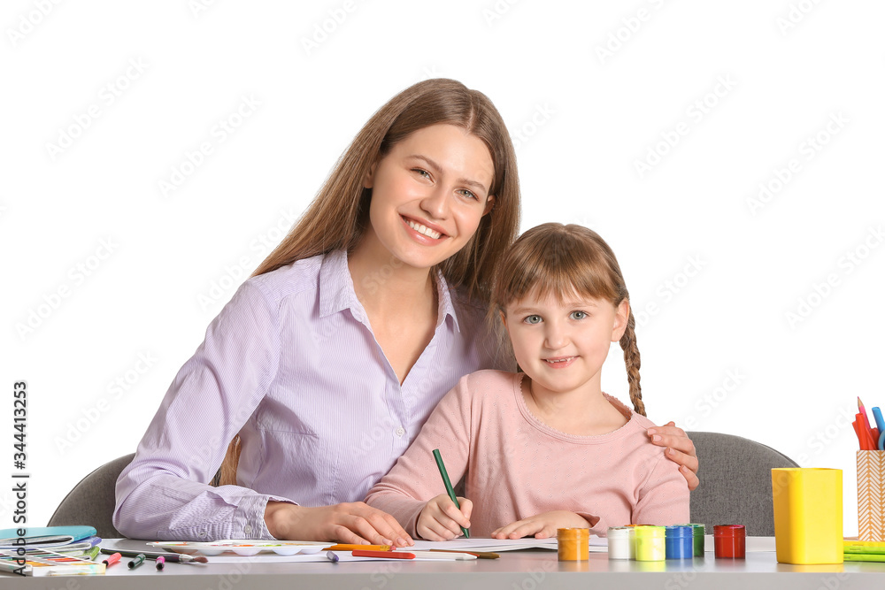 Drawing teacher giving private art lessons to little girl on white background