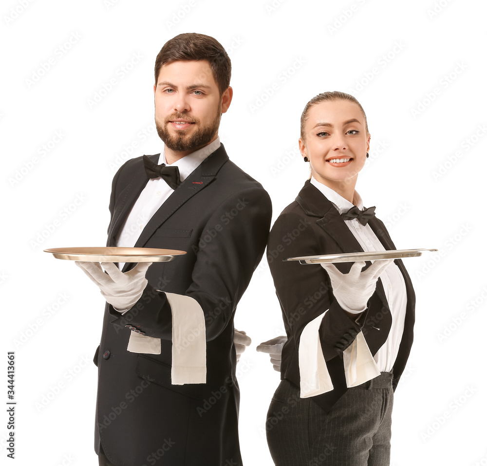 Male and female waiters on white background