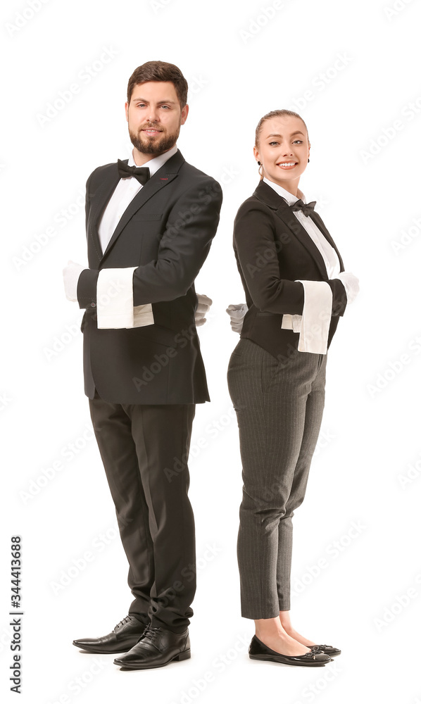 Male and female waiters on white background