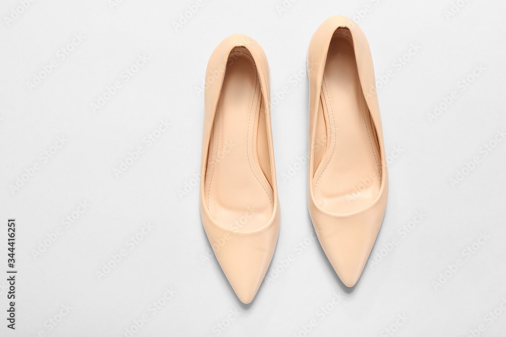 Stylish shoes on white background