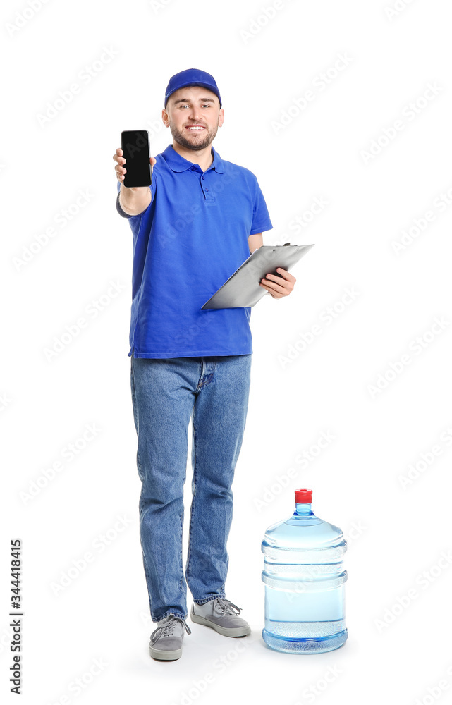 Delivery man with bottle of water and mobile phone on white background