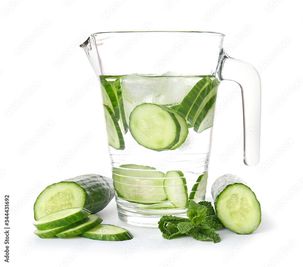 Jug of cucumber infused water on white background