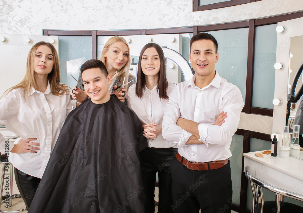 Young people during professional courses in hairdressers salon