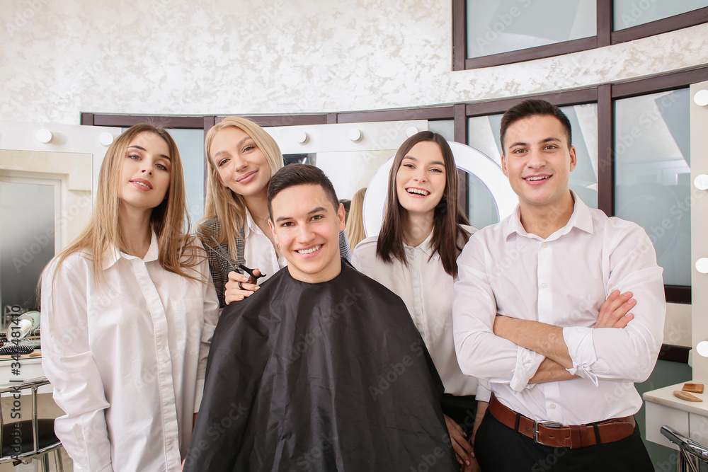 Young people during professional courses in hairdressers salon