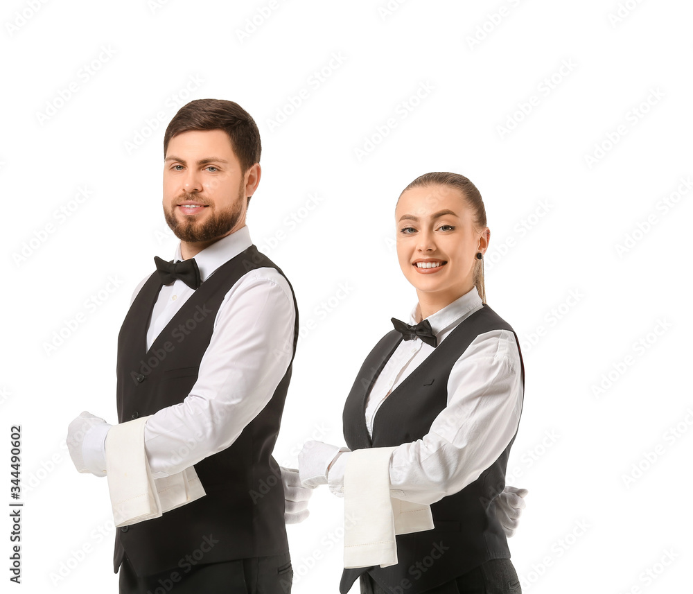 Male and female waiters on white background