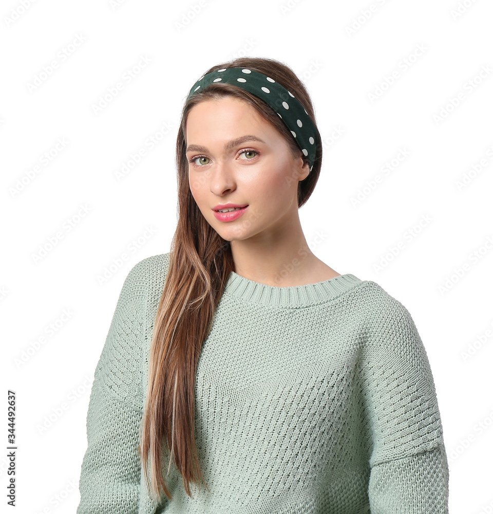 Beautiful young woman with stylish scarf on white background