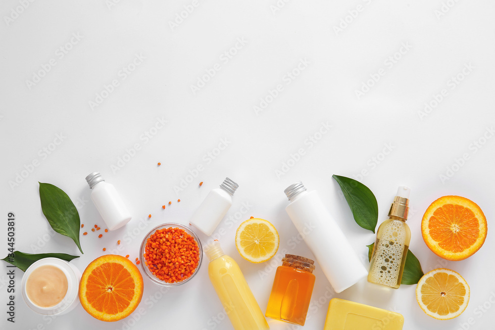 Natural cosmetics with ingredients on white background