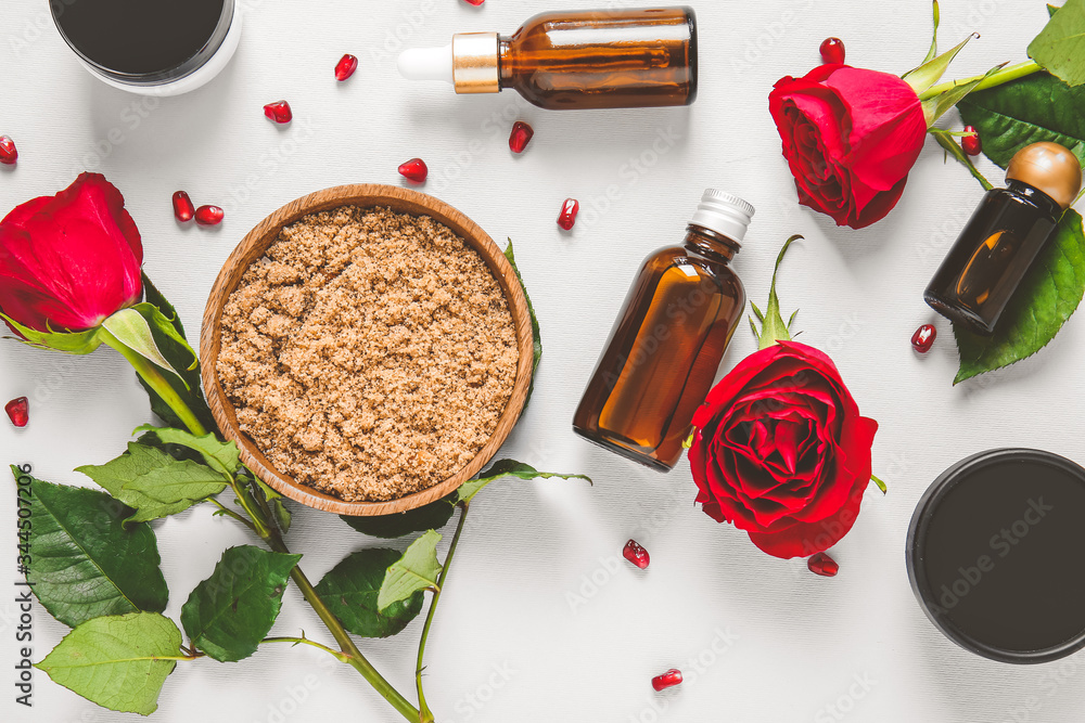 Natural cosmetics with ingredients on white background