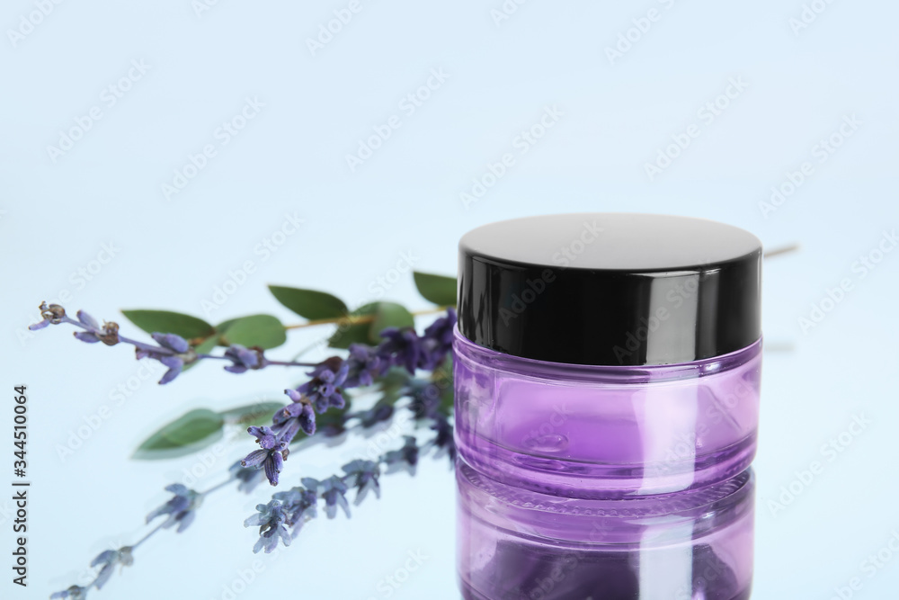 Natural cosmetics with lavender on light background