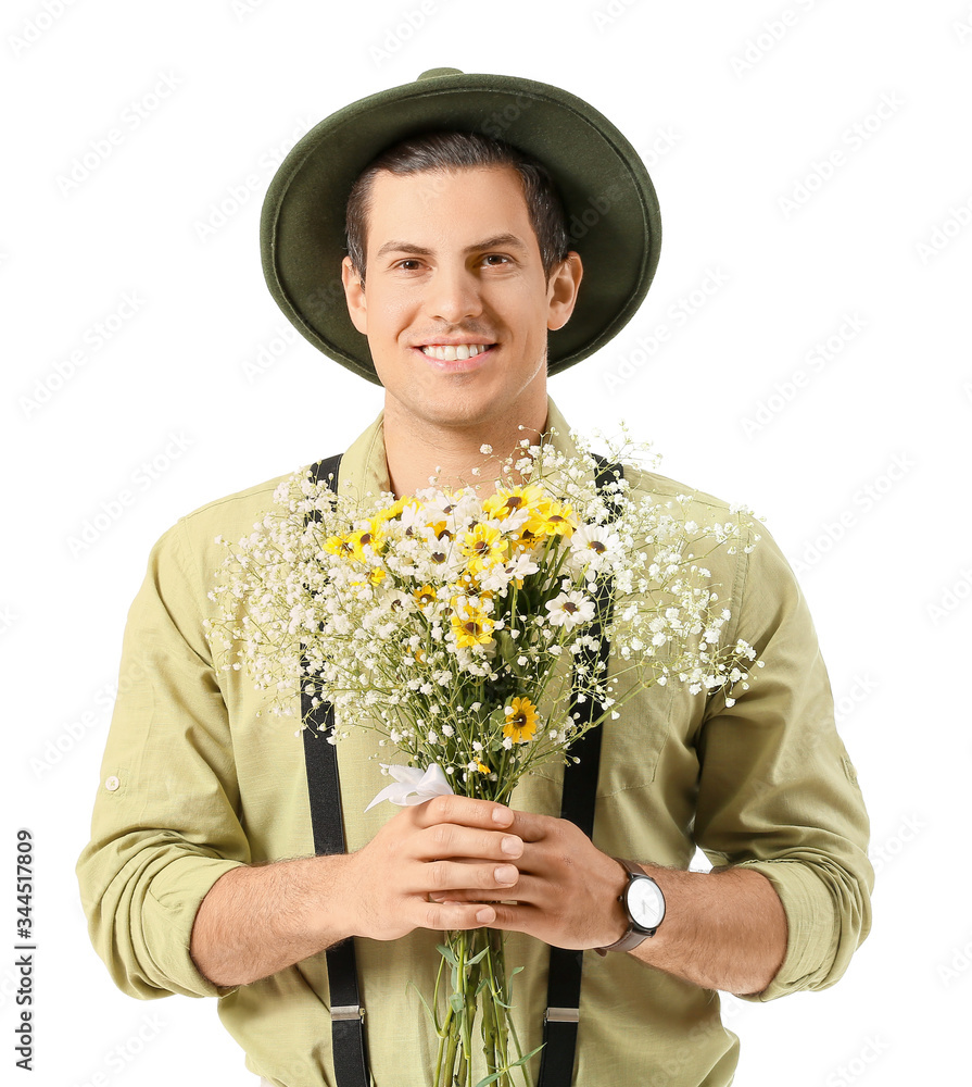 Handsome man with bouquet of flowers on white background