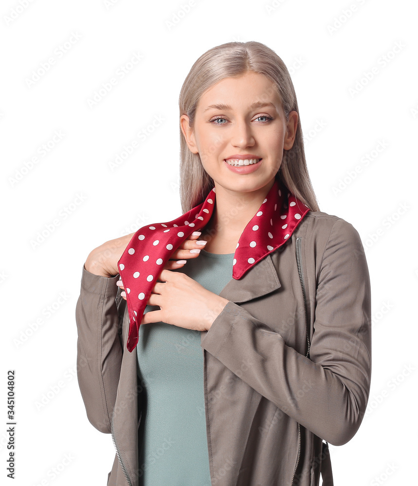 Beautiful young woman with stylish scarf on white background