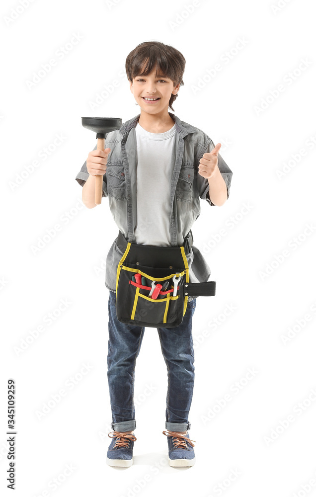 Portrait of little plumber showing thumb-up gesture on white background