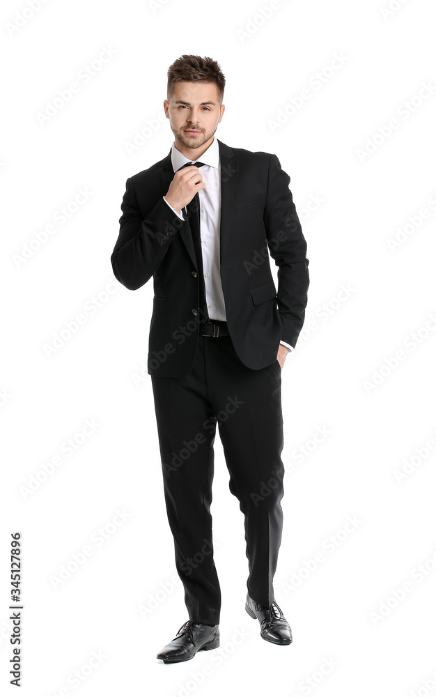 Portrait of handsome young businessman on white background