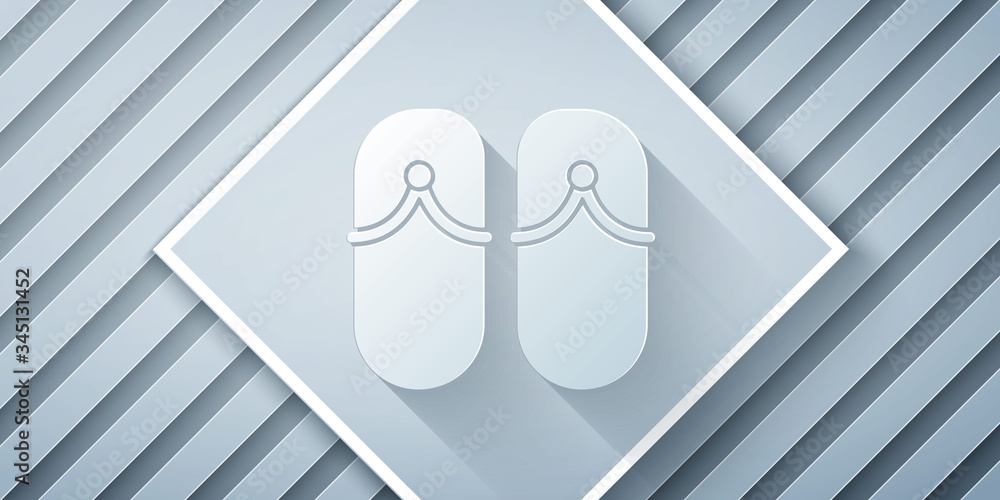 Paper cut Flip flops icon isolated on grey background. Beach slippers sign. Paper art style. Vector 