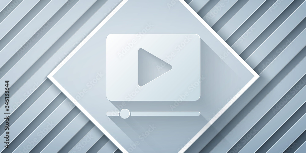 Paper cut Online play video icon isolated on grey background. Film strip with play sign. Paper art s