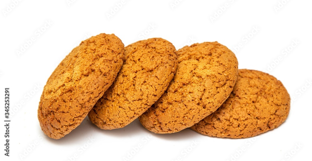 Round oatmeal cookies on a white background. Nutritious foods associated with protein and fiber.