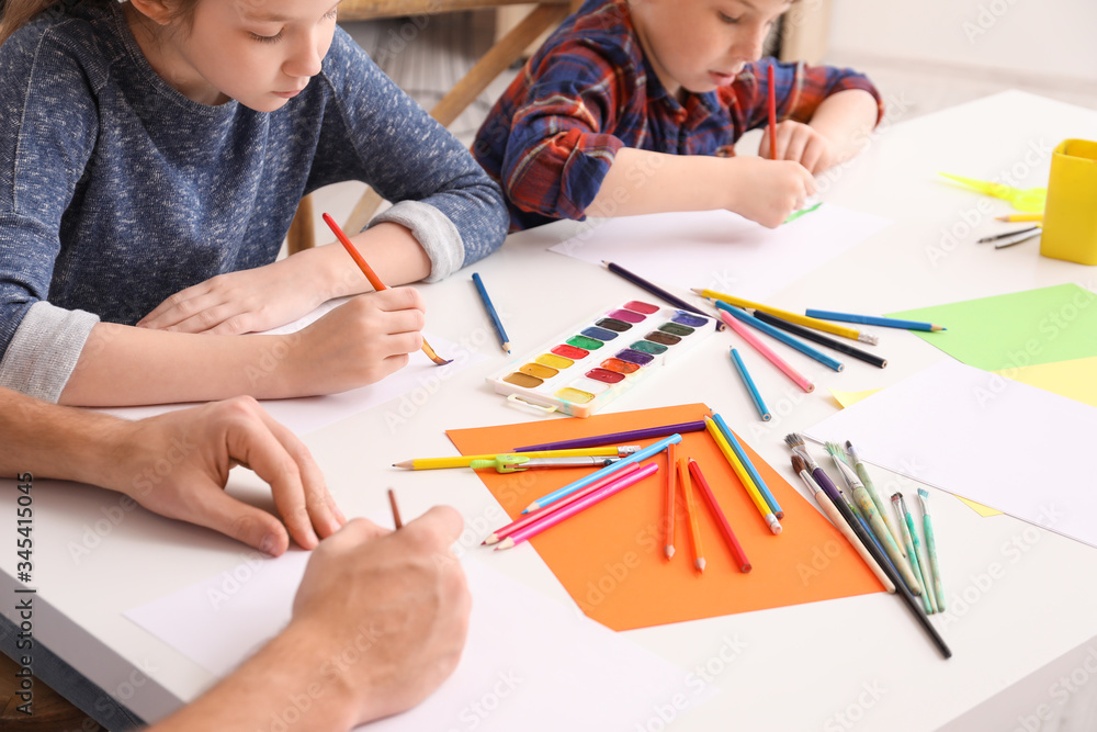 Drawing teacher giving private lessons at home