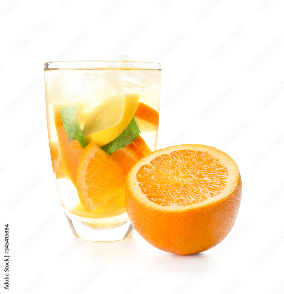 Glass of tasty cold ice tea on white background