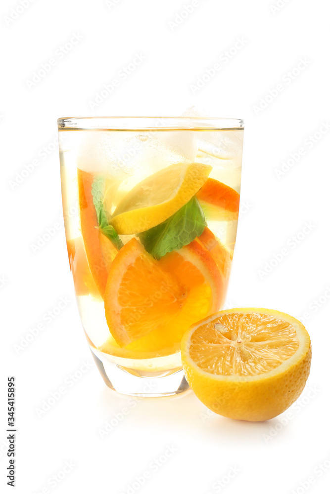 Glass of tasty cold ice tea on white background