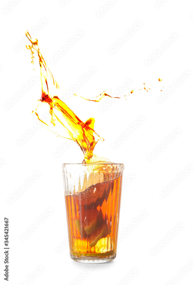 Glass of tasty cold ice tea with splash on white background