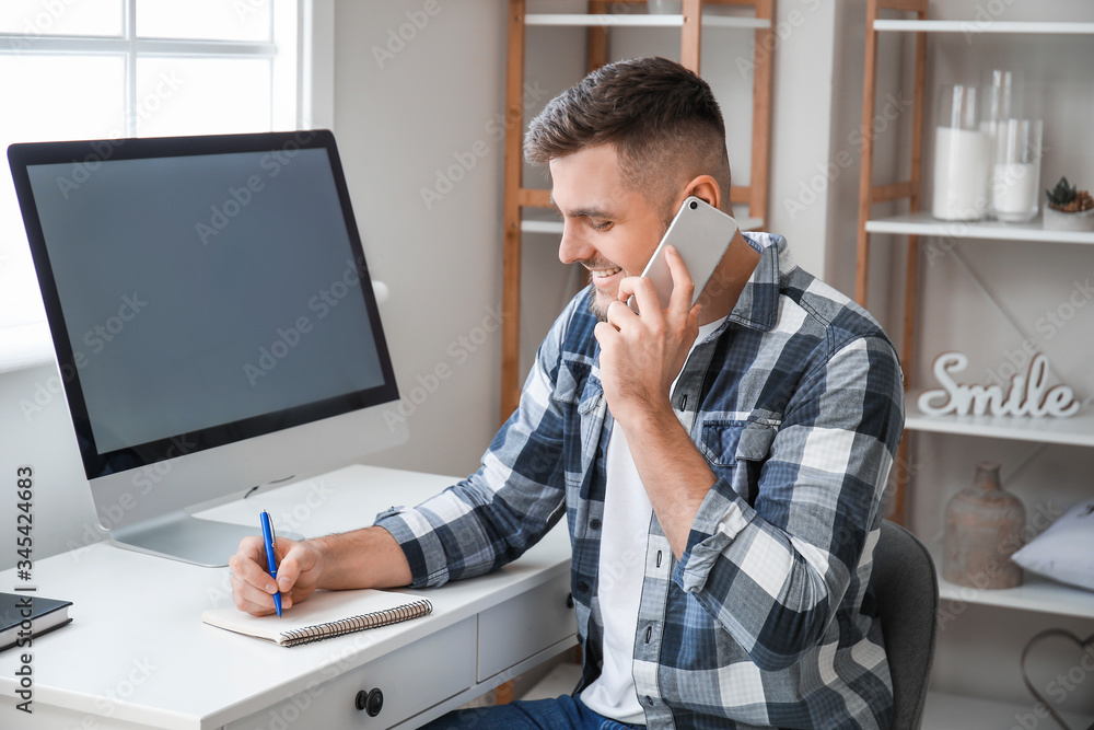 Male technical support agent working at home