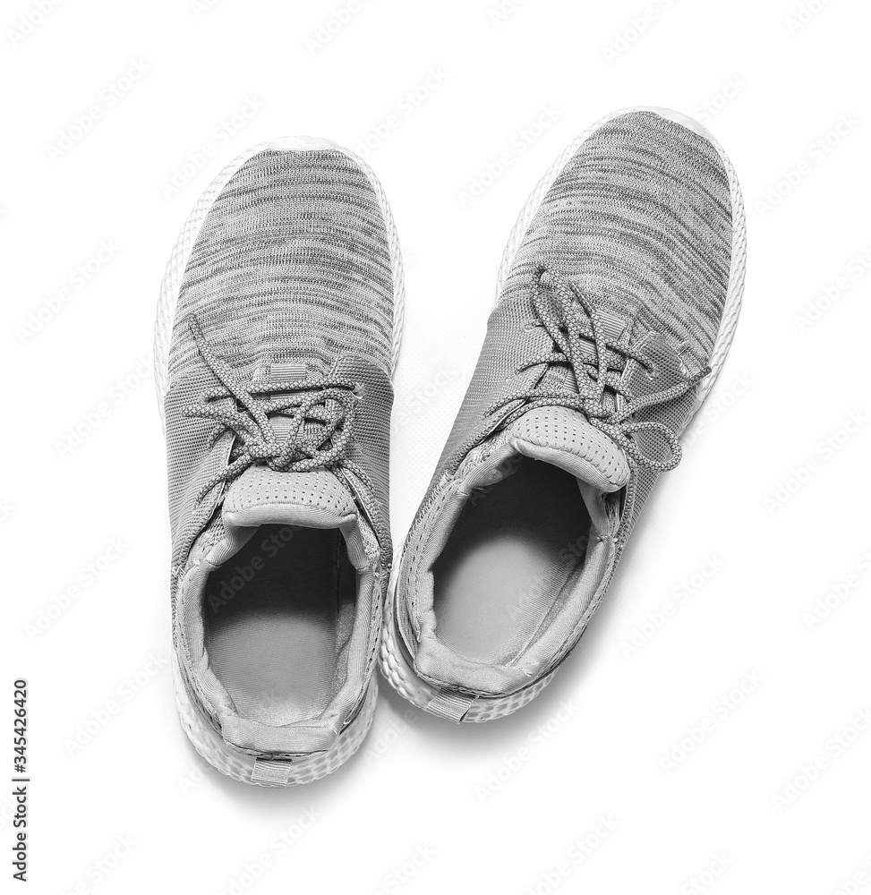 Pair of sport shoes on white background