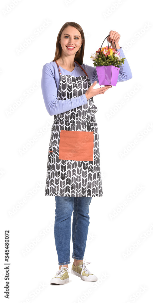 Portrait of female florist with bouquet on white background