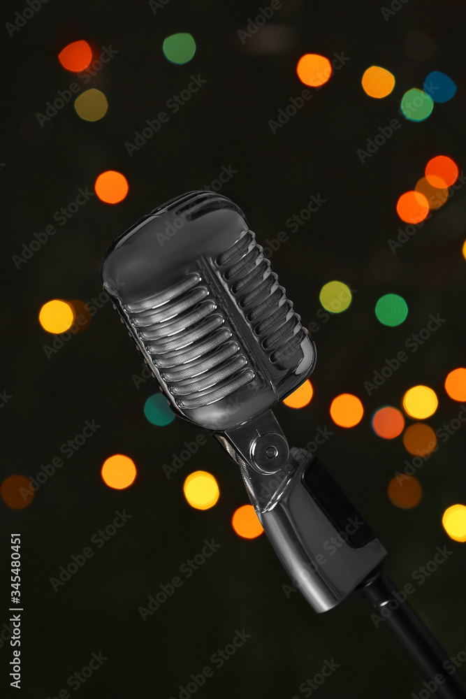 Retro microphone on dark background