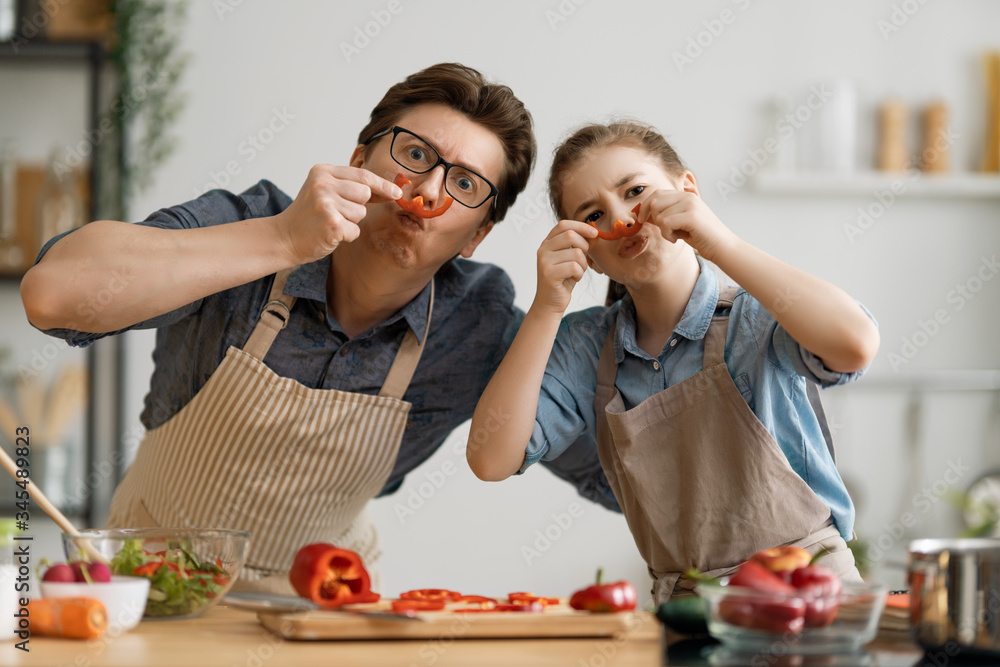 Happy family in the kitchen.