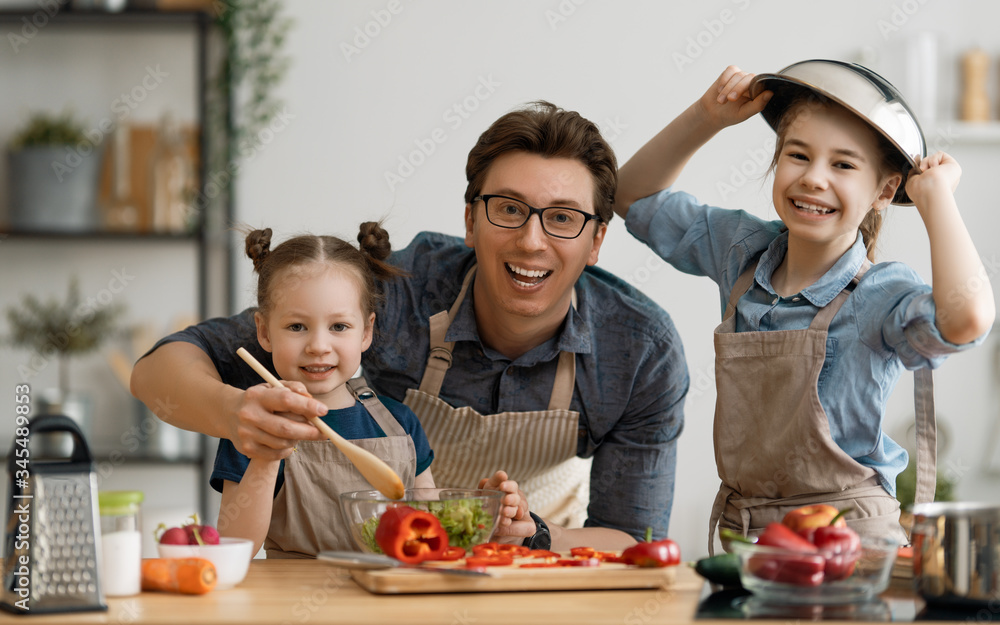 Happy family in the kitchen.